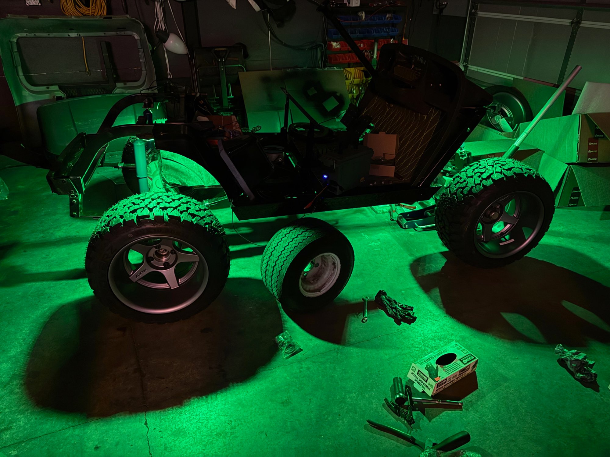 Green underglow test — late night in the garage