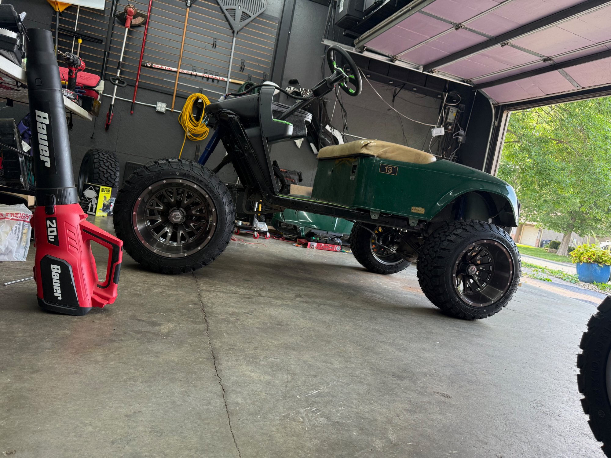 New wheels being fitted mid-build